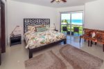 Guest bedroom 1 with king bed and ocean view